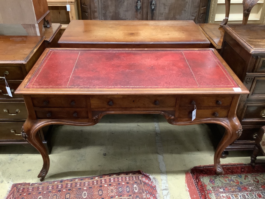 A Victorian walnut kneehole rosewood desk by Wilkinson & Son, Old Bond Street, stamped 11761, width 134cm, depth 64cm, height 75cm